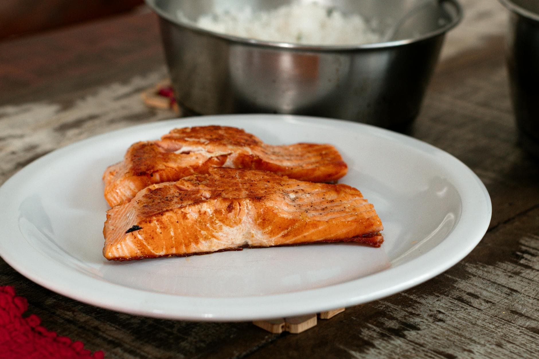 Juicy grilled salmon fillets served on a white plate, perfect for a healthy meal. - healthy salmon recipes