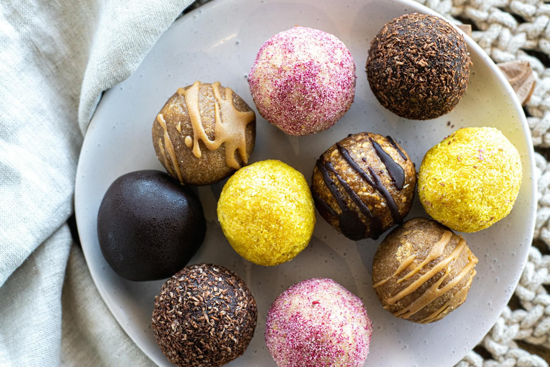 A vibrant selection of homemade protein energy balls perfect for a healthy snack. - healthy snack ideas