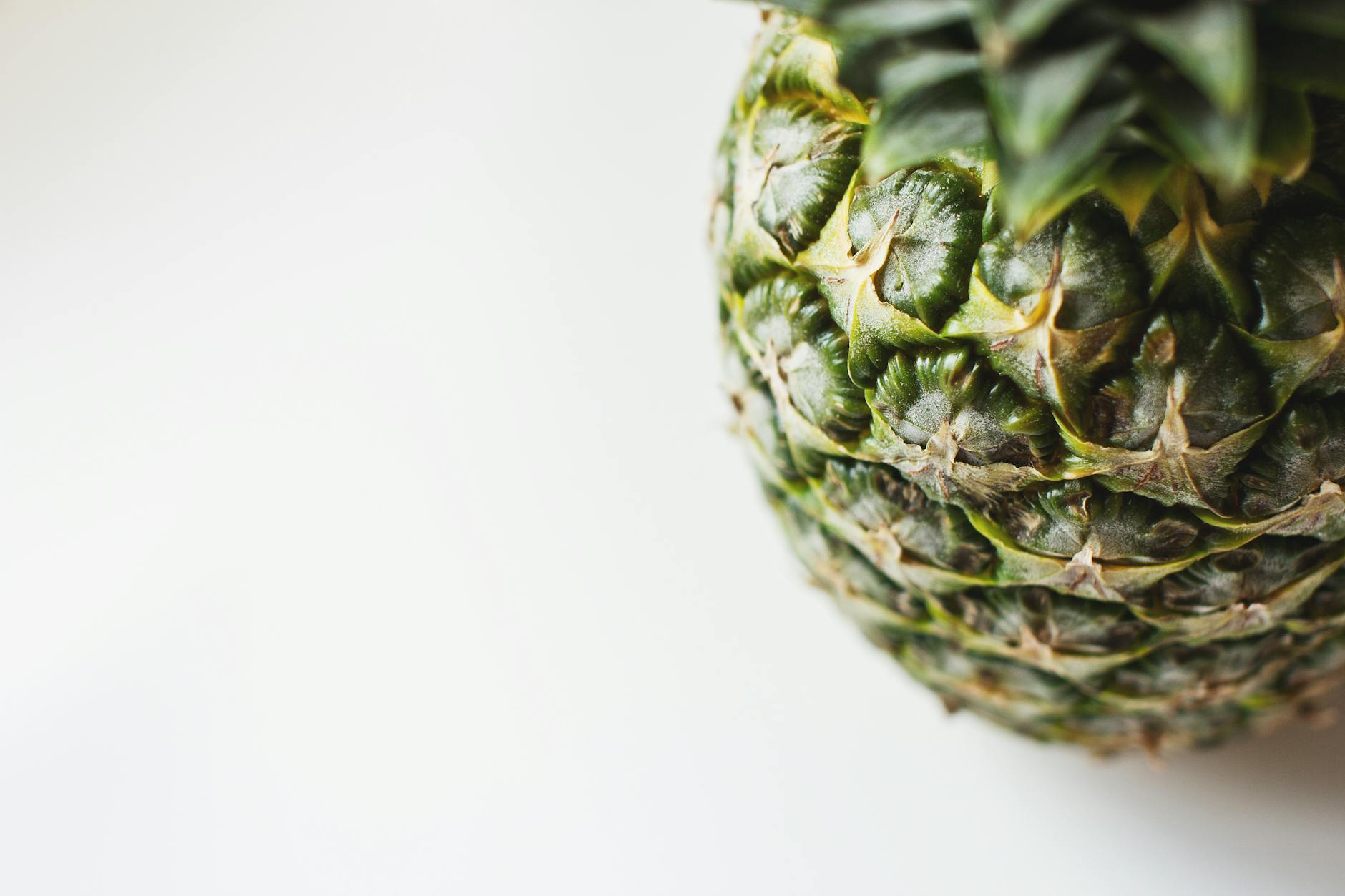 Detailed close-up of a fresh pineapple against a white background. Perfect for tropical themes. - anti inflammatory recipes