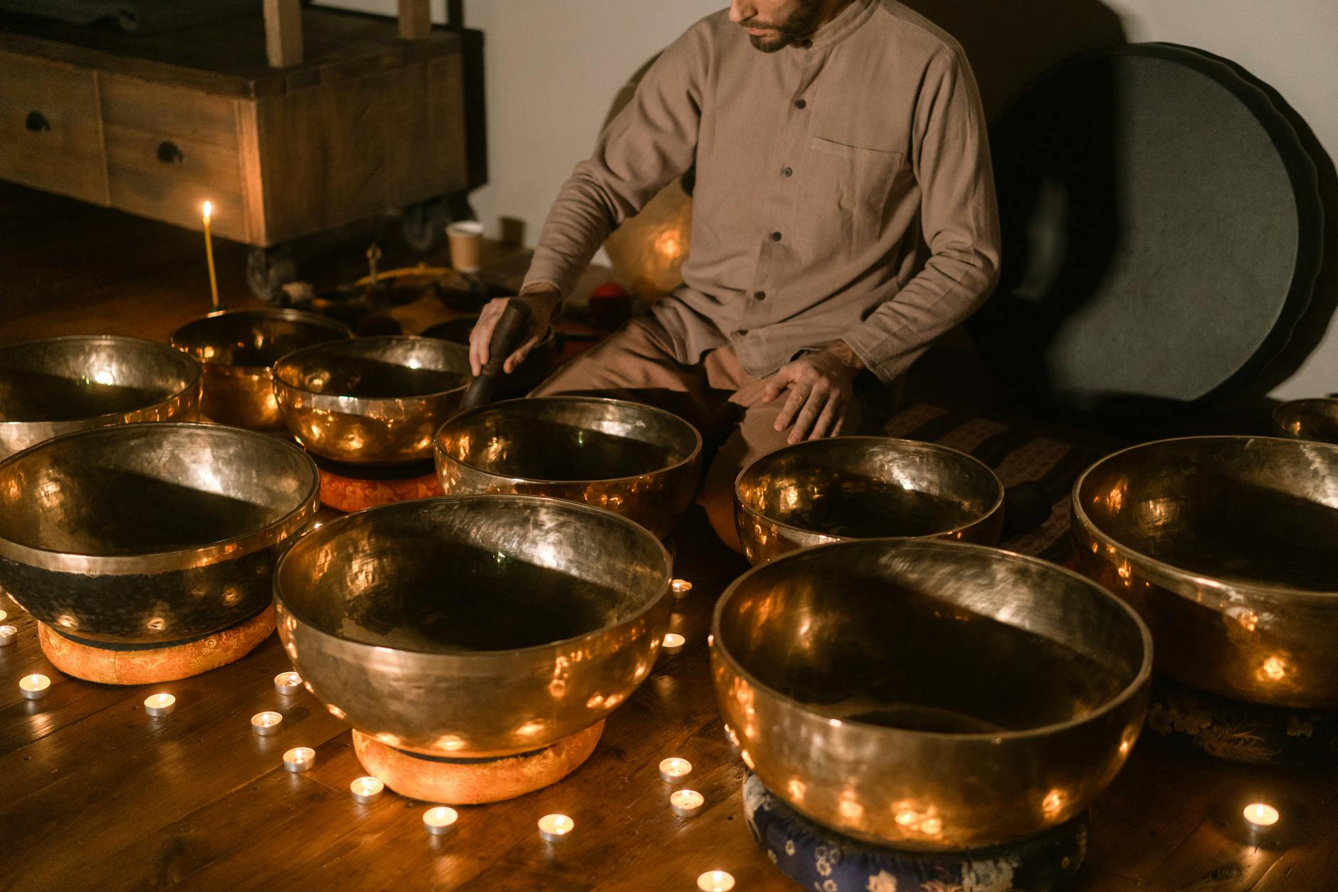 A serene setting with Tibetan singing bowls and candles, perfect for meditation and relaxation. - guided mindfulness meditation youtube