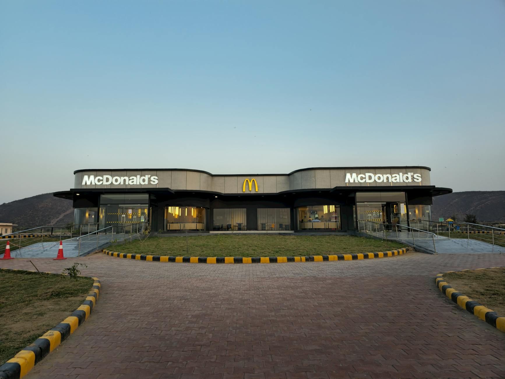 Front view of a McDonald's restaurant in Baghola, India at sunset. - healthiest mcdonald's breakfast