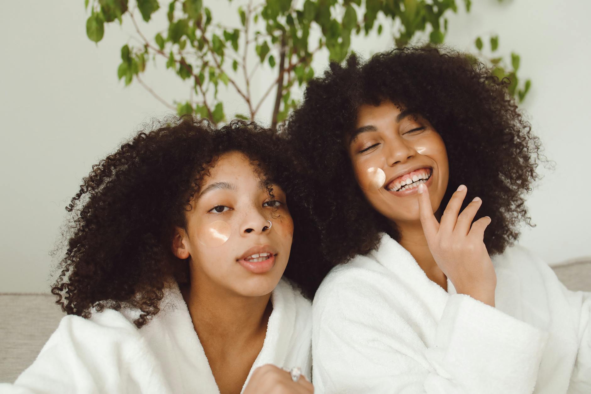 Two women enjoying a skincare routine, showcasing happiness and natural beauty. - best organic skincare