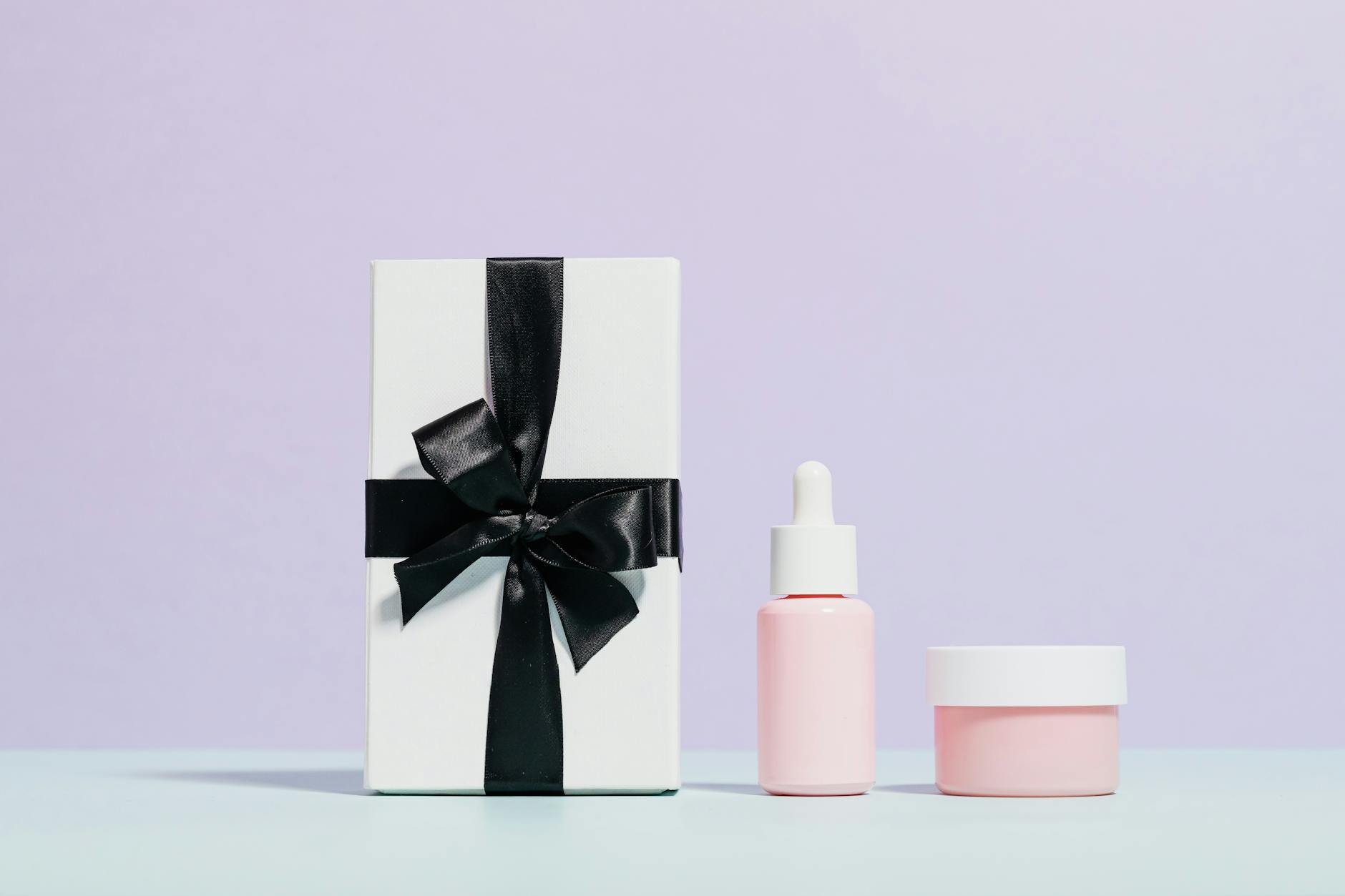 Elegant display of beauty products with a gift box, perfect for marketing and promotion. - buy natural skin care products