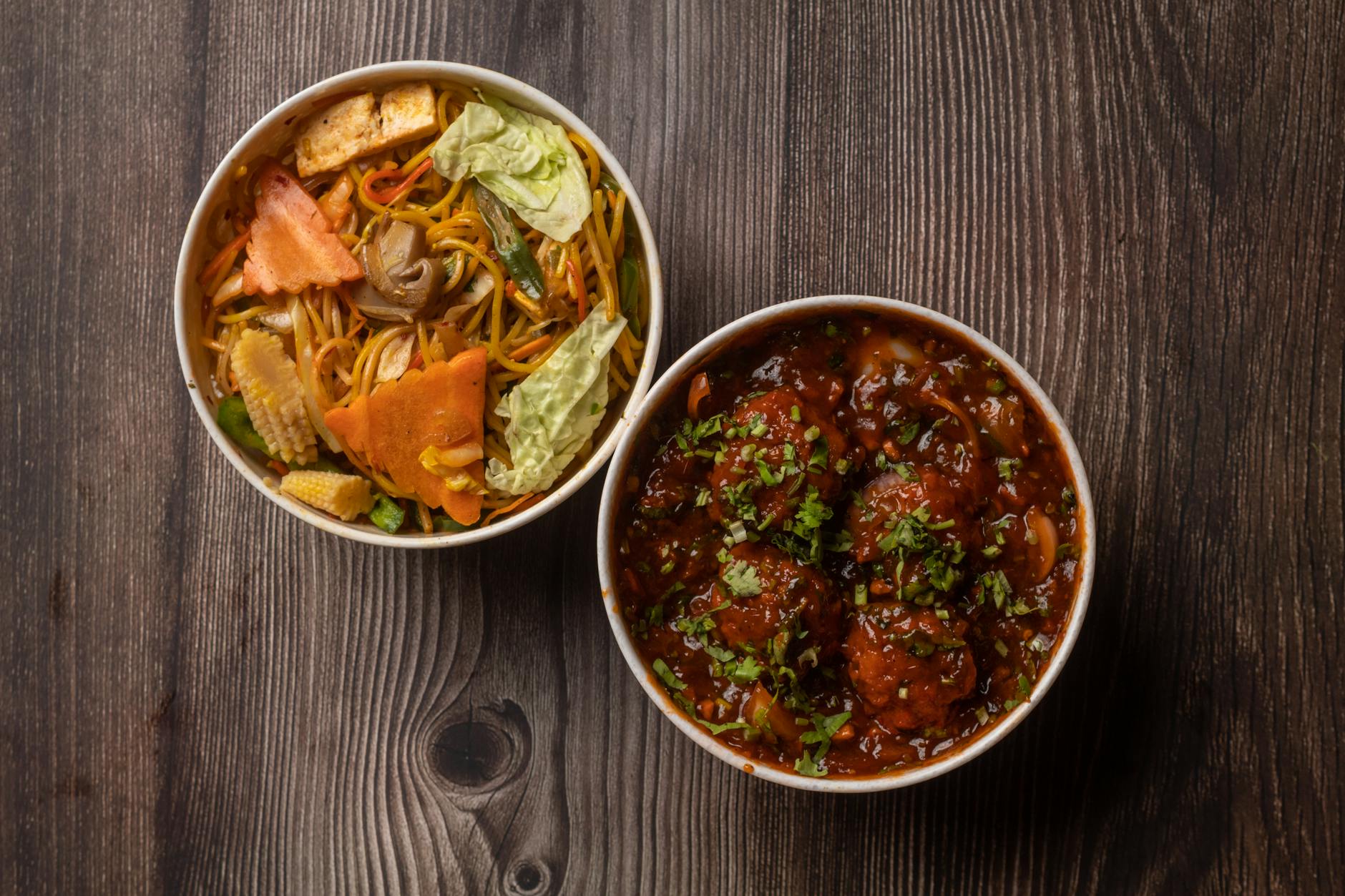 Indulge in a flavorful Indo-Chinese combo of vegetable noodles and spicy Manchurian for a delightful meal. - healthy dinner for two