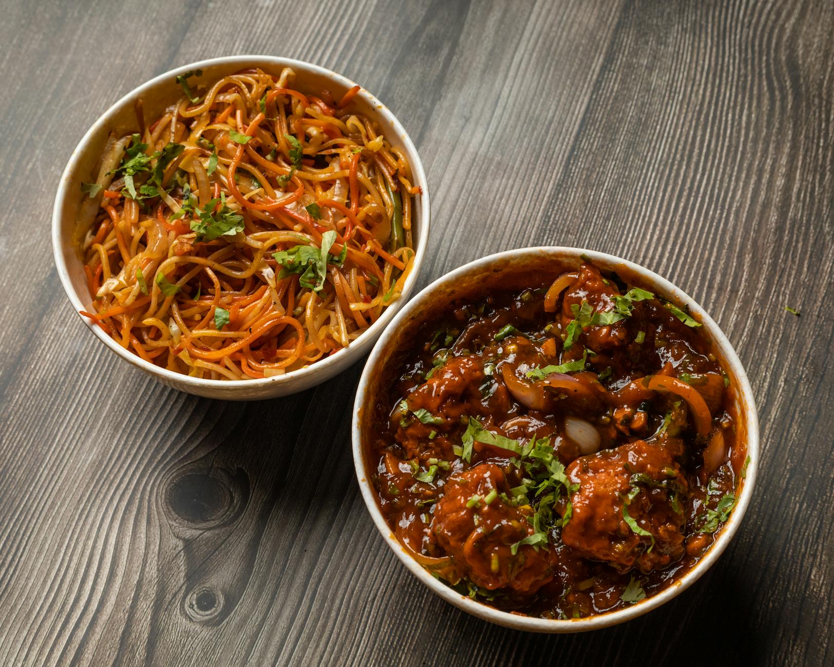 Savor the spicy Indian-style noodle and Manchurian combo, a perfect meal for flavor lovers. - healthy dinner for two