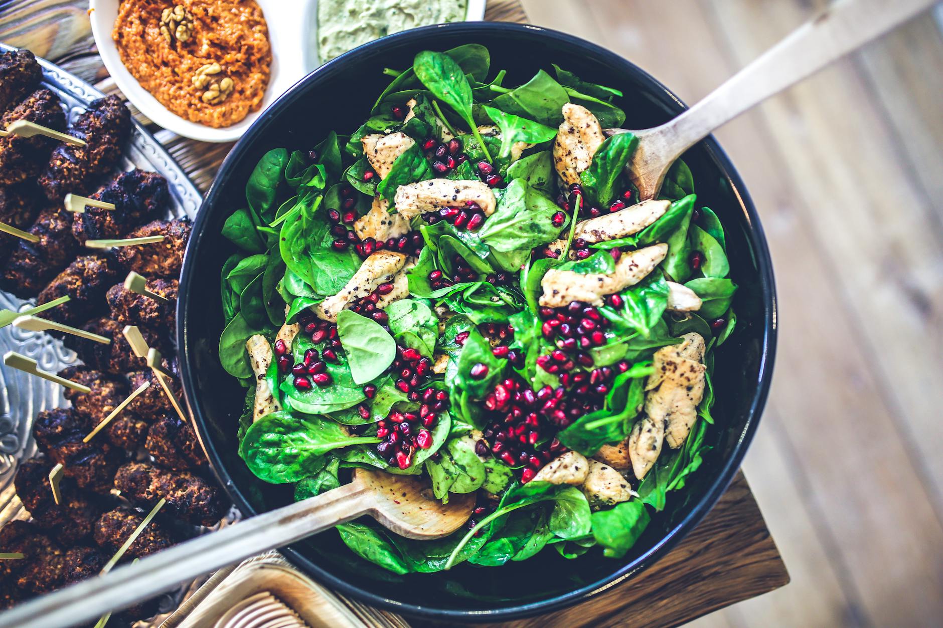 Healthy and vibrant spinach salad with grilled chicken and pomegranate seeds, perfect for a nutritious meal. - healthy lunch recipes