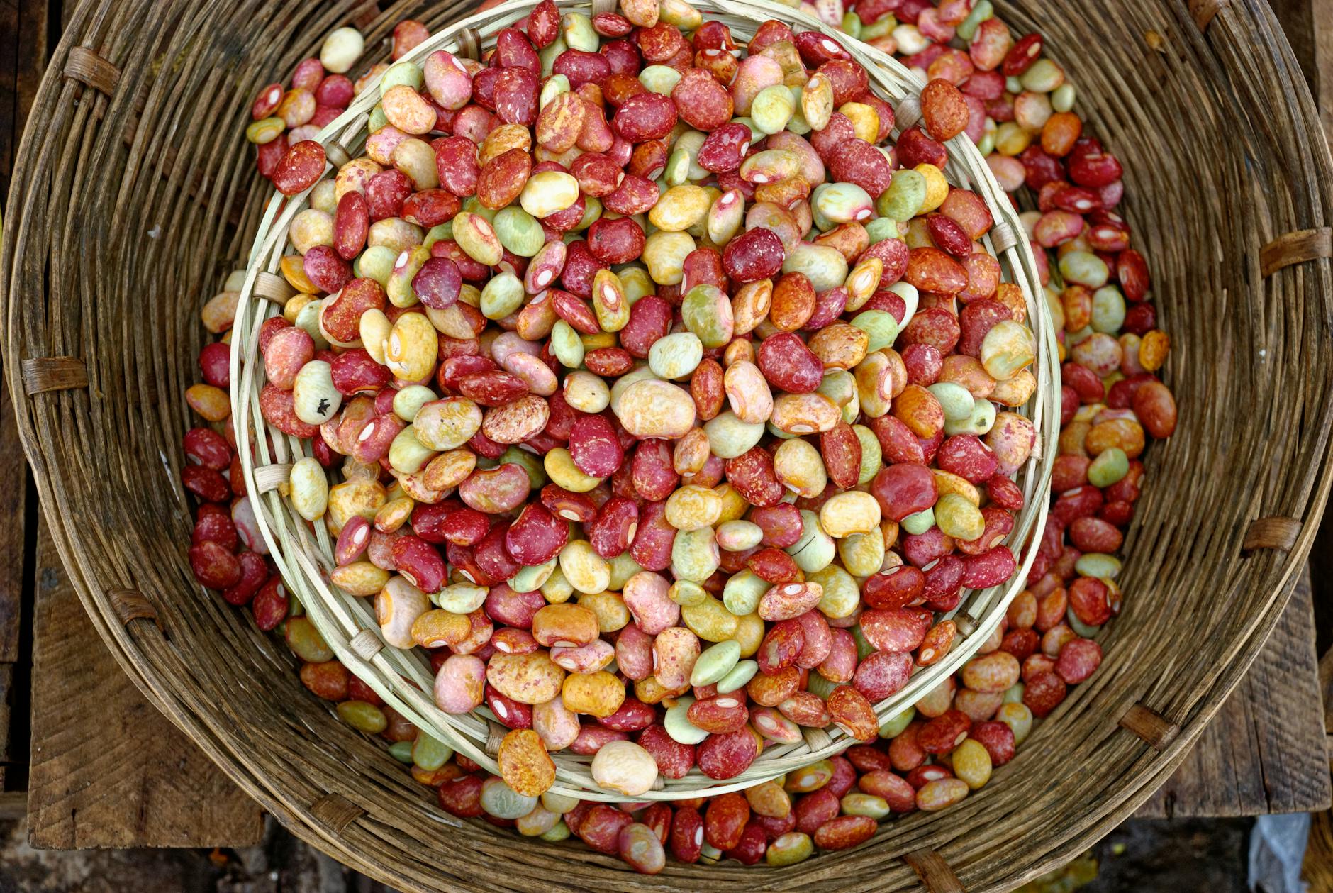 Vibrant mix of beans in a woven basket showcasing fresh harvest. Ideal for food and farming themes. - organic plant protein