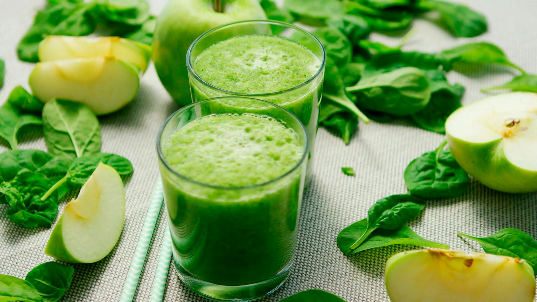 Fresh green smoothie with apples and spinach, perfect for a healthy refreshment. - spring energy smoothie