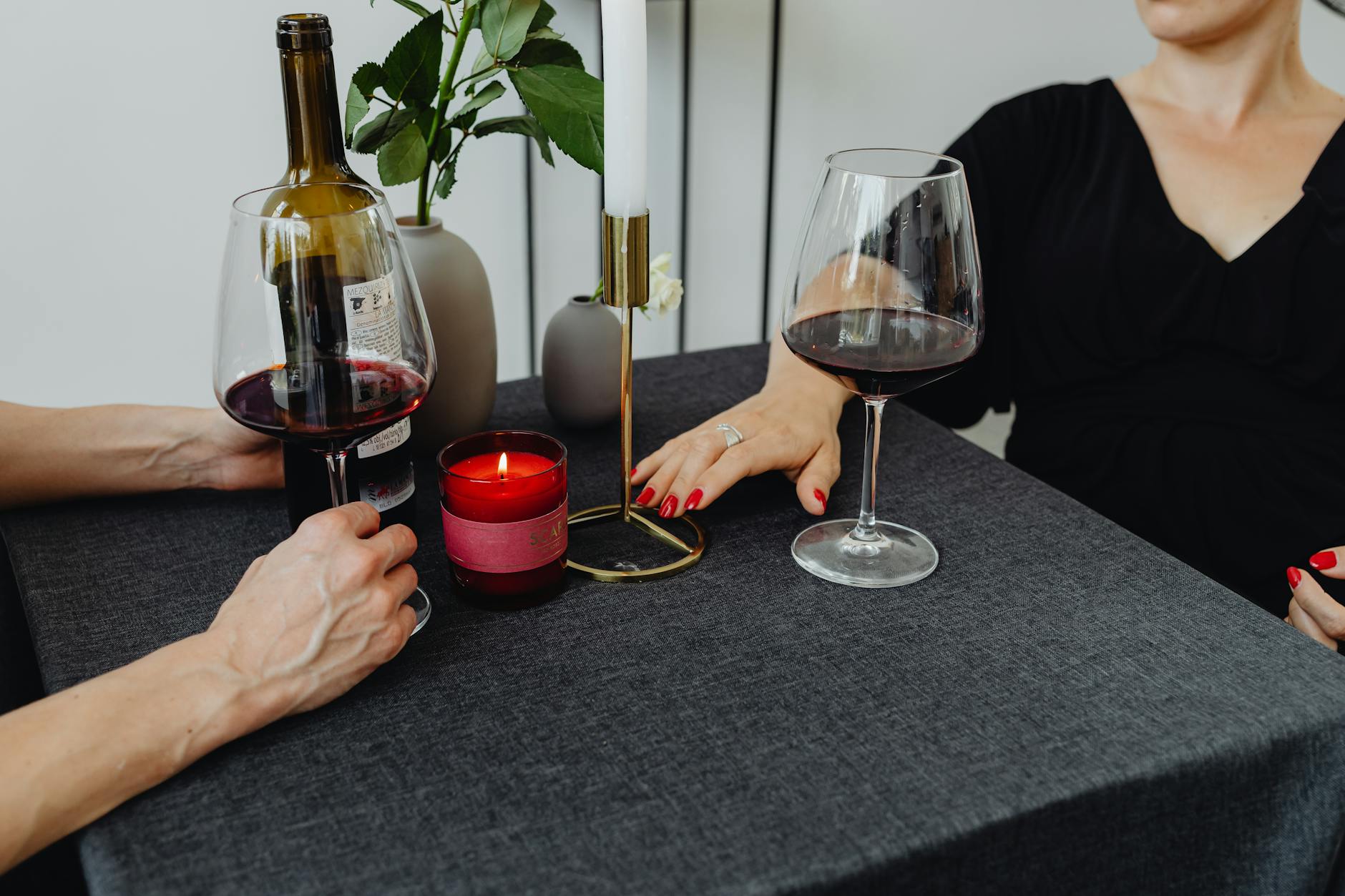 Intimate dinner with red wine and candles, perfect for a romantic evening. - easy dinner for two