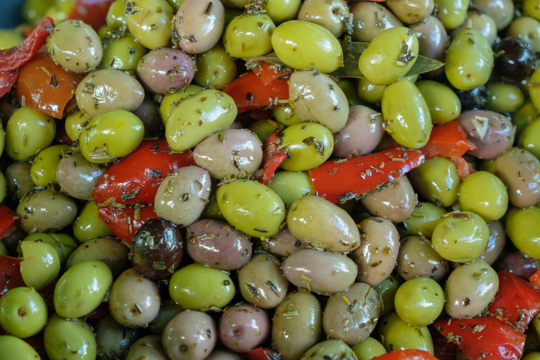 Vibrant mix of marinated olives and red peppers. Perfect for food photography. - mediterranean dash diet