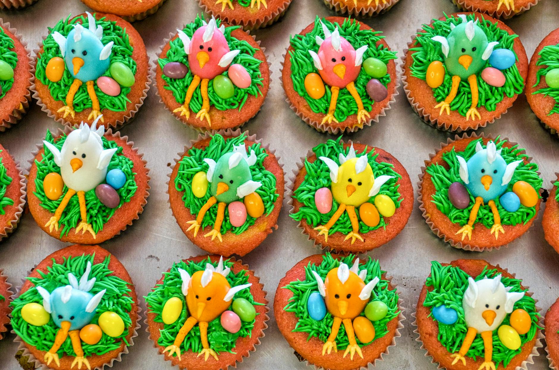 Vibrant cupcakes featuring icing chicks and colorful decorations perfect for Easter celebrations. - spring sweet cravings