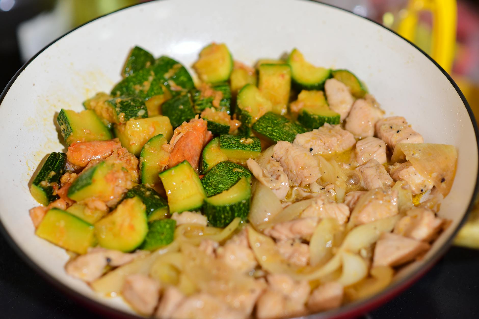 Sautéed chicken and zucchini mix in a pan for a healthy meal. - weight watchers recipes