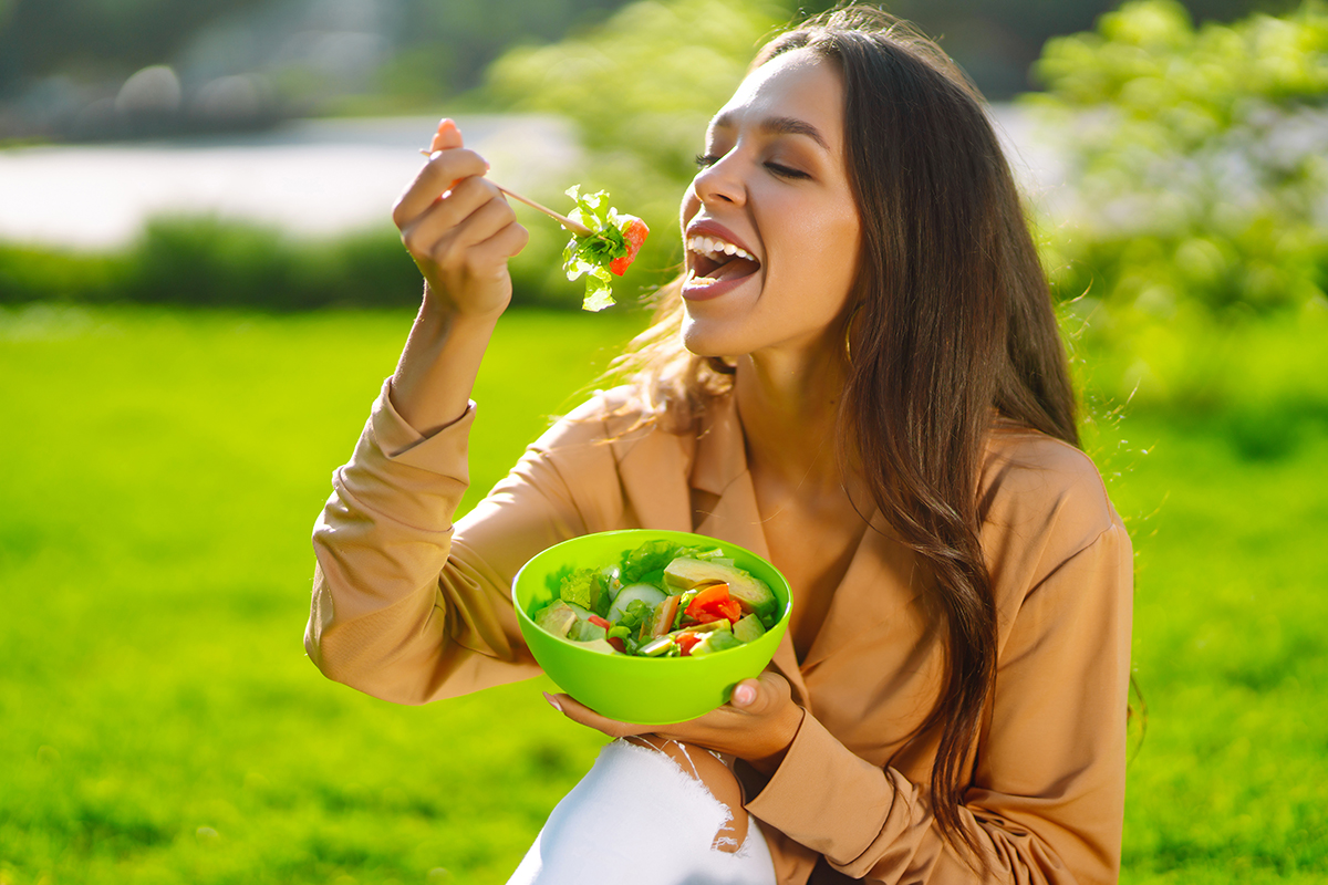Woman eating small meal, a concept often misunderstood in diet myths