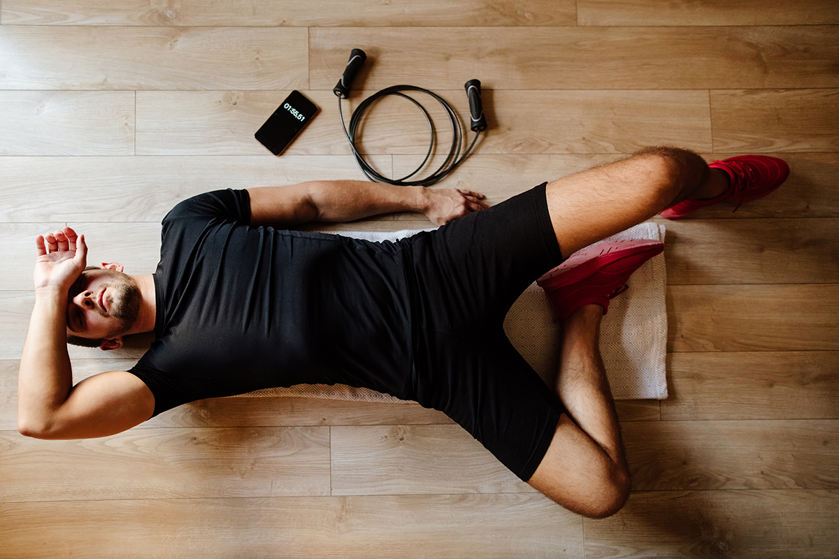 A fatigued athlete indicating the effects of overtraining