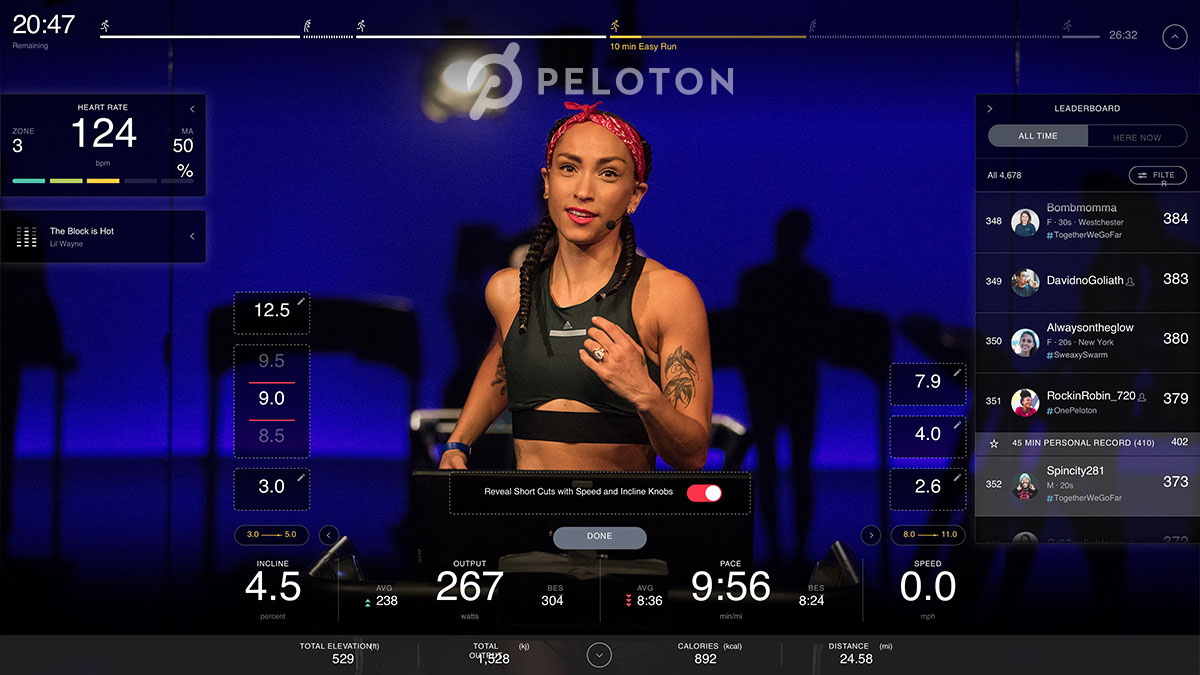 Peloton logo and an image of a Peloton workout in progress