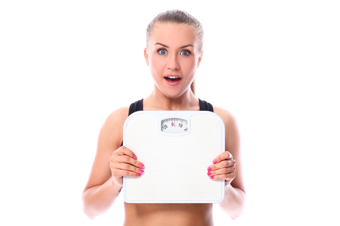 Woman visualizing weight loss goals